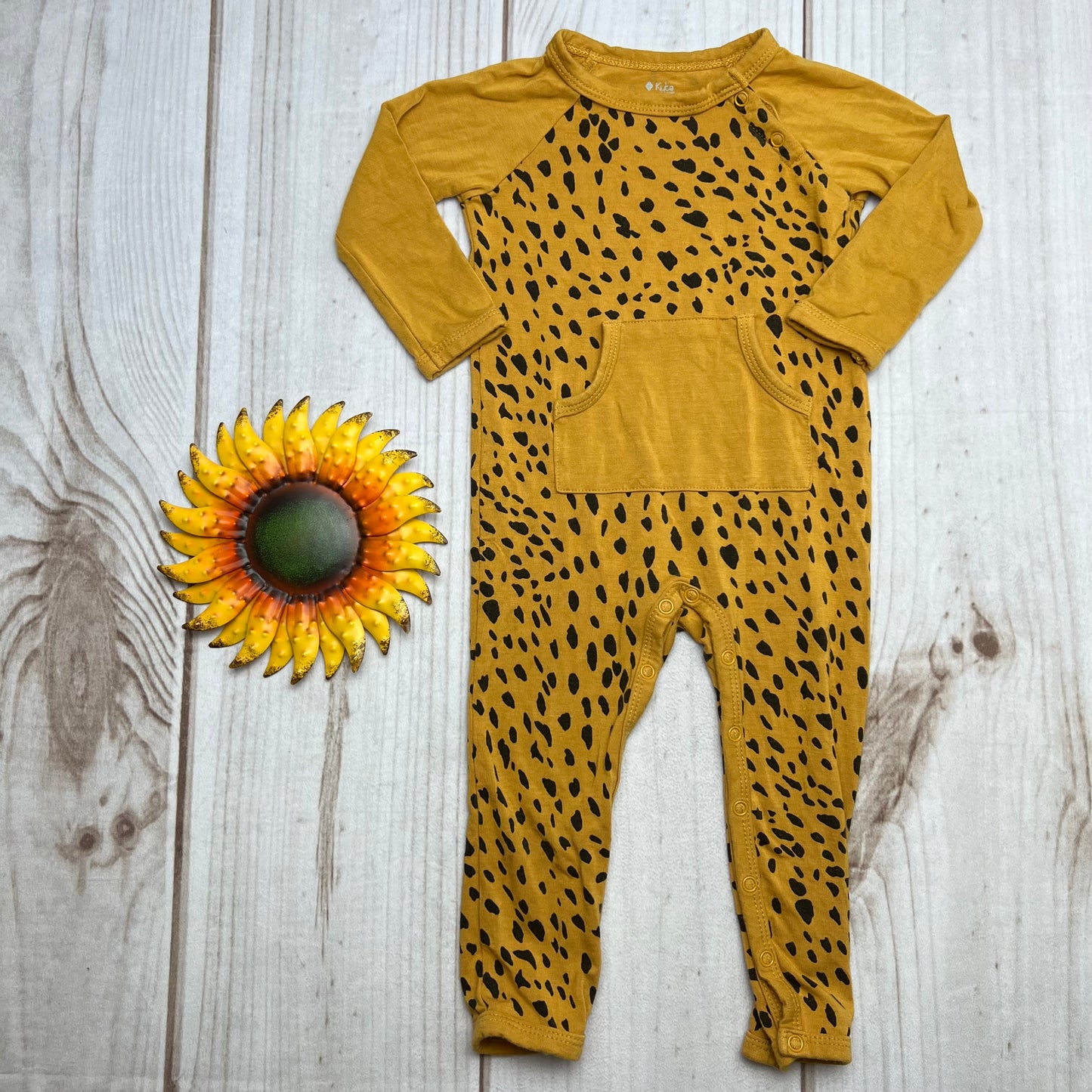 kyte baby marigold cheetah romper 6-12M