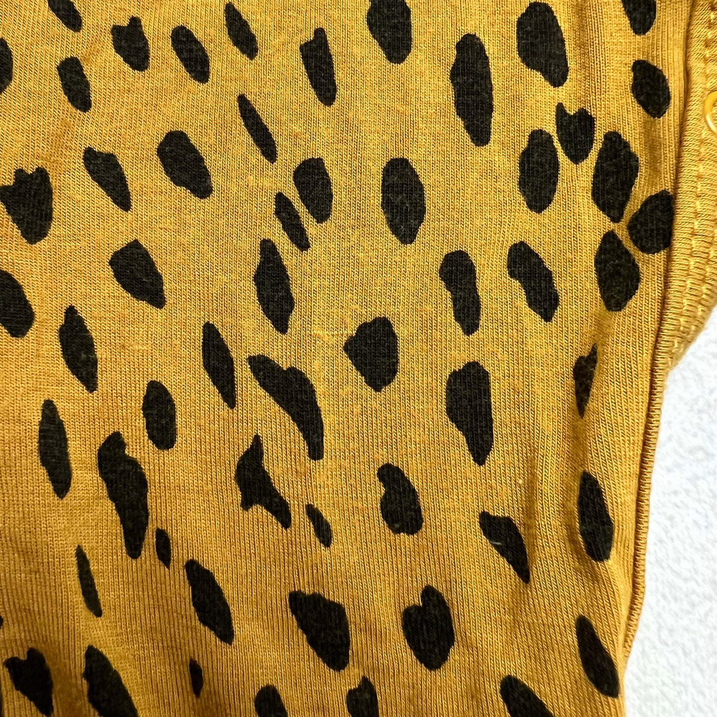 kyte baby marigold cheetah romper 6-12M